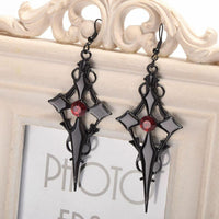 Thumbnail for black cross dangle earrings
