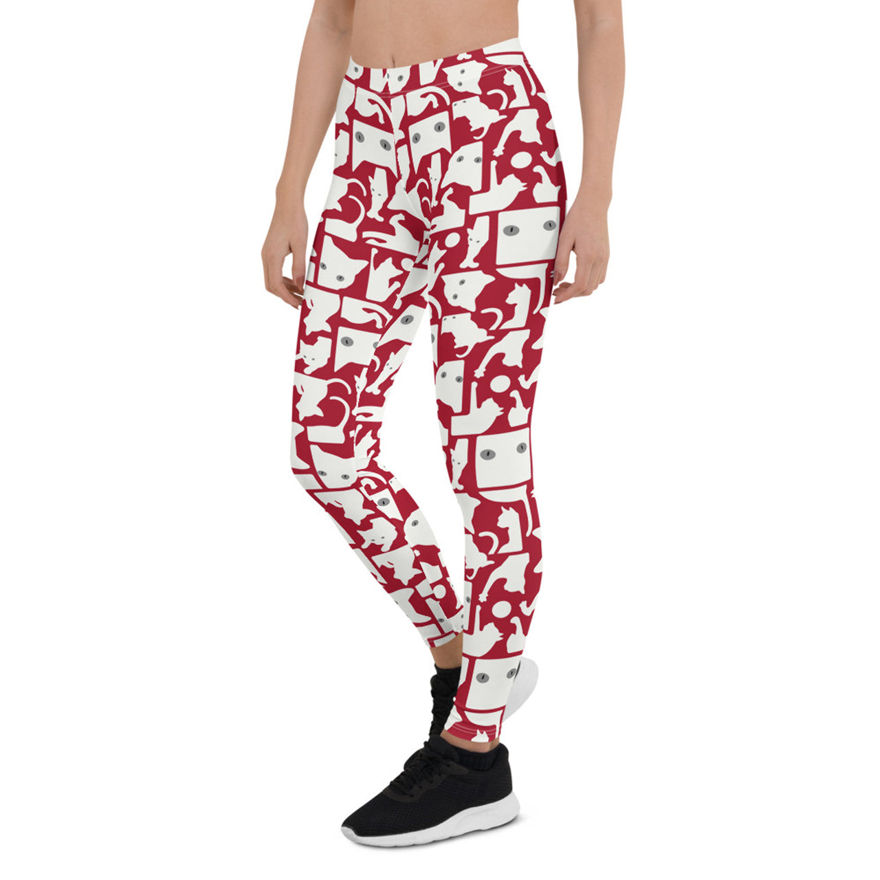 red leggings with white cats on them